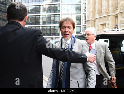 Sir Cliff Richard (centre) arrives at the Rolls Building in London for the continuing legal action against the BBC over coverage of a police raid at his apartment in Berkshire in August 2014. Stock Photo