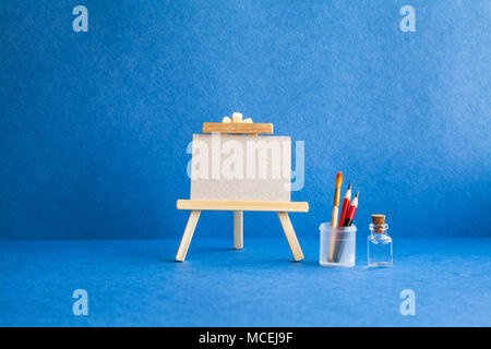 Wooden easel for artists. Stand for a picture. On white background,  isolated. Art, creativity, hobby, job and creative occupation concept Stock  Photo - Alamy