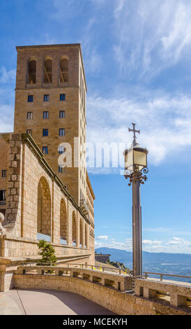 A view of the tower at Santa Maria de Montserrat Abbey in Spain. The facade as we see today was designed by Francesc Folguera. Stock Photo