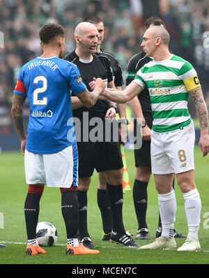 Refreee Bobby Madden with Rangers captain James Tavernier (left) and Celtic's Scott Brown (right) before the William Hill Scottish Cup semi final match at Hampden Park, Glasgow. Stock Photo