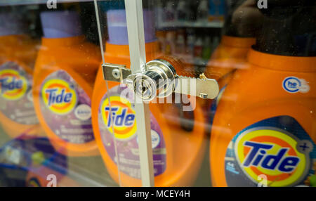 Packages of Procter & Gamble's Tide detergent are locked up to deter shoplifters in a supermarket in New York on Tuesday, April 10, 2018. Tide is the largest selling detergent in the world. (© Richard B. Levine) Stock Photo