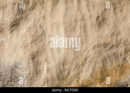 Brown plaster wall Stock Photo