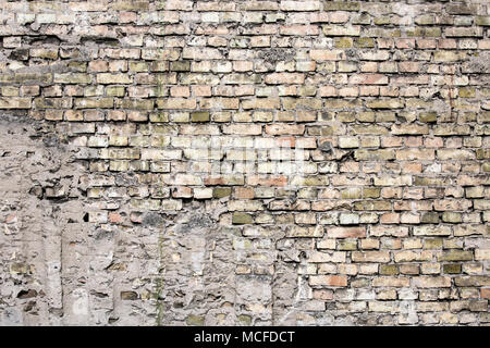 Cracked black brick wall Stock Photo