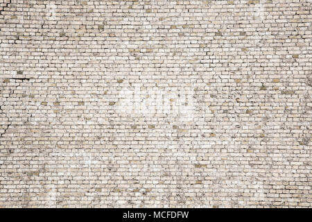 Cracked black brick wall Stock Photo