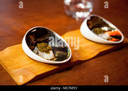 Gourmet michelin-star cuttlefish with Osetra caviar dish at a restaurant (Dos Palillos, Barcelona, Spain) Stock Photo