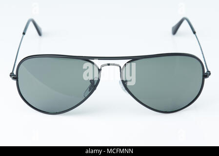 Front view of sunglasses with polarized lens isolated on white background Stock Photo