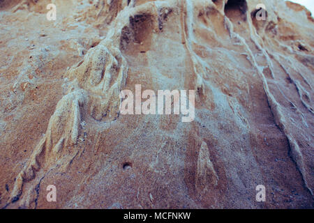 Stone. Stone on the beach with a pattern made by the sea. Stock Photo