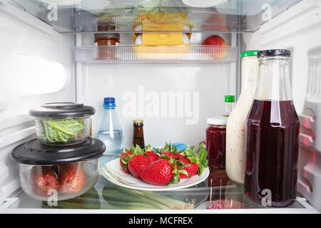 Groceries inside a closed fridge Stock Photo Alamy