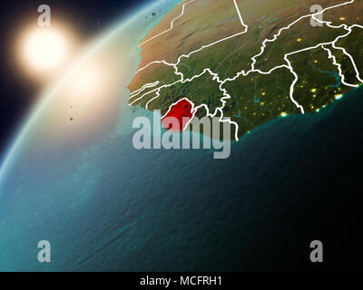 Sierra Leone during sunrise highlighted in red on planet Earth with ...