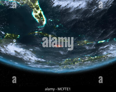 Jamaica at night highlighted in red on planet Earth with clouds. 3D illustration. Elements of this image furnished by NASA. Stock Photo