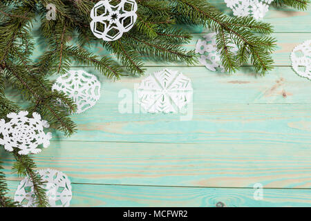 Paper snowflake and tied with twine. Stock Photo