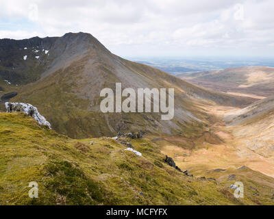 The Carneddau peak of Yr Elen viewed across Cwm Caseg from the northern slopes of neighbouring Carnedd Llewelyn Stock Photo