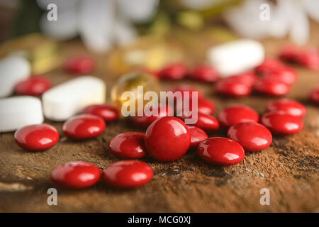 Composition with nutritional supplement capsules and vitamins Stock Photo