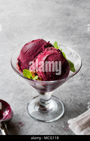 Organic Berry Sorbet Ice Cream Balls in Cup Ready to Eat. Organic Food. Stock Photo