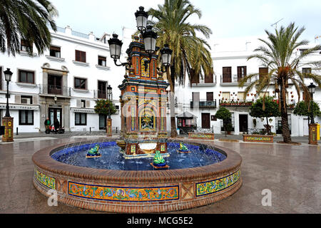 Vejer de la Frontera is a Spanish hilltop town and municipality in the province of Cádiz, Andalusia,Spain, Spanish. ( Fountain at the Plaza de Espana in the white village of Vejer de la Frontera, Costa de La Luz,  ) Stock Photo