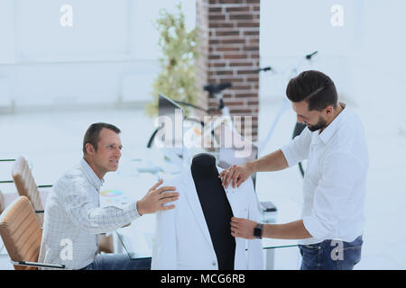 menswear designers working in the Studio. Stock Photo