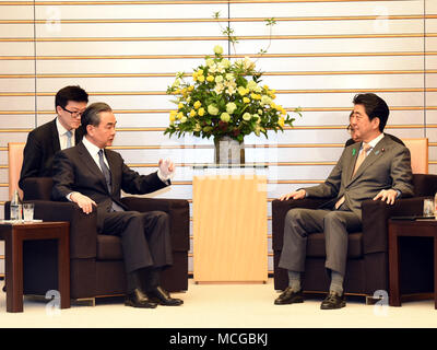 Tokyo, Japan. 16th Apr, 2018. Japanese Prime Minister Shinzo Abe (R front) meets with Chinese State Councilor and Foreign Minister Wang Yi (L front) in Tokyo, Japan, April 16, 2018. Credit: Ma Ping/Xinhua/Alamy Live News Stock Photo
