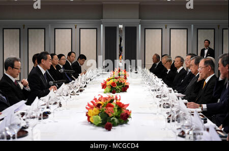 Tokyo, Japan. 16th Apr, 2018. Chinese State Councilor and Foreign Minister Wang Yi (2nd L) meets with representatives of seven Japan-China friendship organizations in Tokyo, Japan, April 16, 2018. Credit: Ma Ping/Xinhua/Alamy Live News Stock Photo