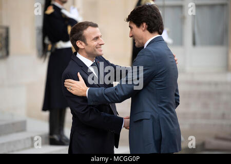 Paris, France. 16th Apr, 2018. French President Emmanuel Macron (L) meets with visiting Canadian Prime Minister Justin Trudeau at the Elysee Palace in Paris, France, on April 16, 2018. Credit: Jack Chan/Xinhua/Alamy Live News Stock Photo