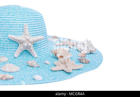 Starfish and seashells on a hat. Stock Photo