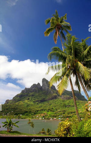 The extinct volcano of Mount Otemnau, with beautiful lush tropical landscape surrnounding it, Bora Bora, French Polynesia. Stock Photo