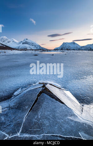 Frozen fjord with broken ice, ice landscape, Gimsoy, Lofoten, Norway Stock Photo