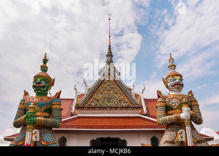 Temple with temple guards, Wat Arun, Temple of Dawn, Bangkok, Thailand Stock Photo
