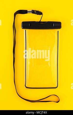Waterproof Case for Smartphone on Yellow Background Stock Photo
