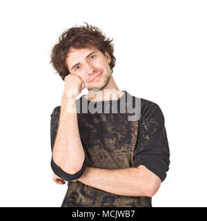 Nice guy pointing his cheek by hand and posing to camera Stock Photo