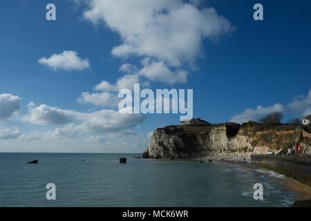 A sunny day with some white clouds at Freshwater Bay on the Isle of Wight United Kingdom UK Stock Photo