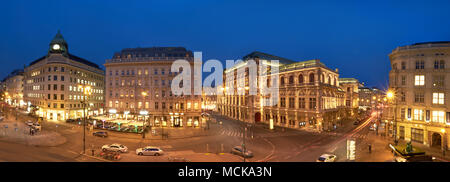 VIENNA, AUSTRIA - MARCH 19, 2018: Panoramic view from Albertina in the evening, with of Albertinaplatz, Hotel Sacher and the State Opera House. Stock Photo