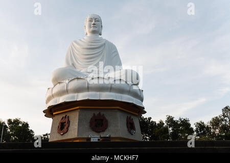Closeup of sitting Buddha statue in white marble in Khanh Hoa Province, Vietnam Stock Photo