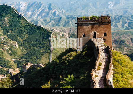 Closeup of tower entrance on Great Wall of China with mountainous  countryside in background Stock Photo