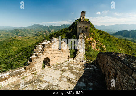 Great Wall of China remote outpost and ruins in green countryside Stock Photo