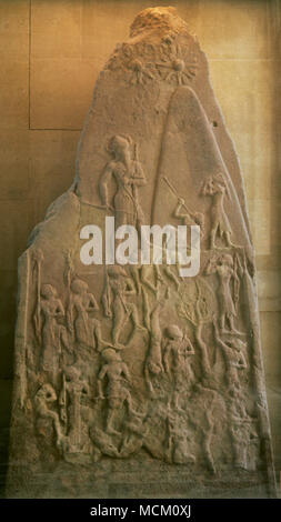 Victory stele of Naram-Sin, King of Akkad. It celebrates the triumph of King Naram-Sin over a mountain people, over Satun, King of the Lullubi. The Akkadian army is climbing the steep slopes of the Zagros Mountains. Mesopotamia. Sipar. Akkadian period, c. 2250 BC. Louvre Museum. Paris, France. Stock Photo