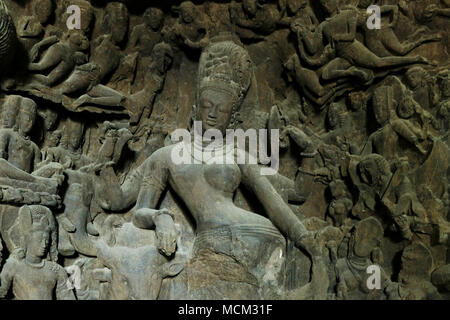 Carving of Ardha Nariswara (siva) in the Elephanta Caves, Mumbai Stock Photo