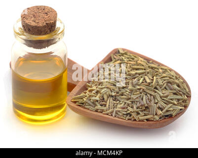 dried organic rosemary with essential oil over white background Stock Photo