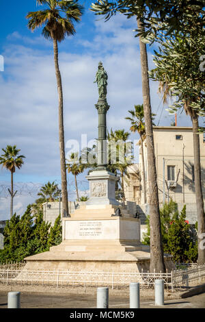 Column of Holy Virgin Mary, Stella Maris Madonna statue, opposite to Stella Maris Monastery in Haifa, Israel. Close-up Stock Photo