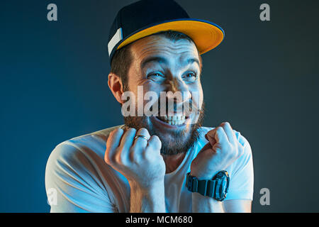 Sports, emotions and fan people concept - sad man watching sports on tv and supporting team at home Stock Photo