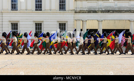 Wellington Barracks, Westminster, London, 17th April 2018. Soldiers from the Foot Guards battalion, Coldstream Guards, and the Coldstream Guards Band, are marching and rehearsing in front of Wellington Barracks, carrying the flags of the Commonwealth countries. London currently hosts the CHOGM, Commonwealth Heads of Government Meeting from 16-20th April 2018. Credit: Imageplotter News and Sports/Alamy Live News Stock Photo