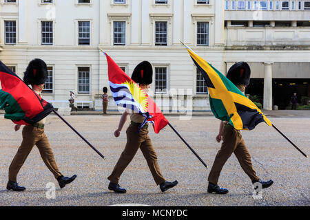 Wellington Barracks, Westminster, London, 17th April 2018. Soldiers from the Foot Guards battalion, Coldstream Guards, and the Coldstream Guards Band, are marching and rehearsing in front of Wellington Barracks, carrying the flags of the Commonwealth countries. London currently hosts the CHOGM, Commonwealth Heads of Government Meeting from 16-20th April 2018. Credit: Imageplotter News and Sports/Alamy Live News Stock Photo