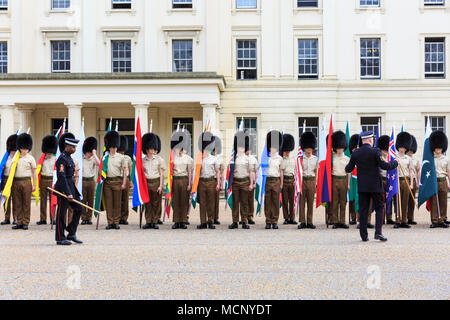 Wellington Barracks, Westminster, London, 17th April 2018. Soldiers from the Foot Guards battalion, Coldstream Guards, and the Coldstream Guards Band, are marching and rehearsing in front of Wellington Barracks, carrying the flags of the Commonwealth countries. London currently hosts the CHOGM, Commonwealth Heads of Government Meeting from 16-20th April 2018. Credit: Imageplotter News and Sports/Alamy Live News Stock Photo