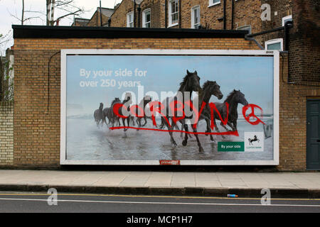 London, UK, 17th April, 2018, A poster in Islington, north London for Lloyds Bank daubed with graffiti in support of local MP Jeremy Corbyn, Ersoy Emin Credit: ersoy emin/Alamy Live News Stock Photo