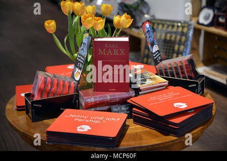 10 April 2018, Trier, Germany: Articles from Karl Marx's Capital to nouse pads are for sale in the 'Trier Souvenir' shop. This product and several others have been created on the occasion of the 200th birthday of the philosopher Karl Marx. Photo: Harald Tittel/dpa