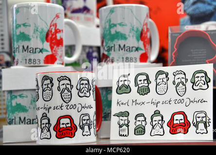 10 April 2018, Trier, Germany: Karl Marx mugs for sale at Trier tourist information. This product and several others have been created on the occasion of the 200th birthday of the philosopher Karl Marx. Photo: Harald Tittel/dpa