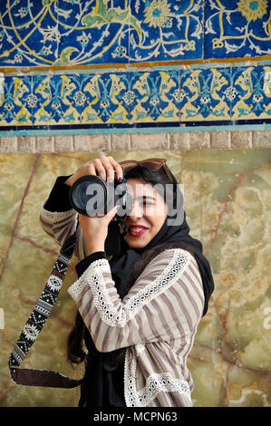 Portrait of girl who is taking photos in Esfahan, Iran © Antonio Ciufo Stock Photo