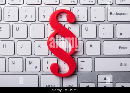 Elevated View Of Red Paragraph Symbol On Laptop Keypad Stock Photo