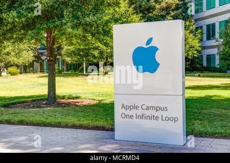 CUPERTINO, CA/USA - JULY 29, 2017: Apple Computer headquarters exterior and logo. Apple Inc. is an American multinational technology company. Stock Photo