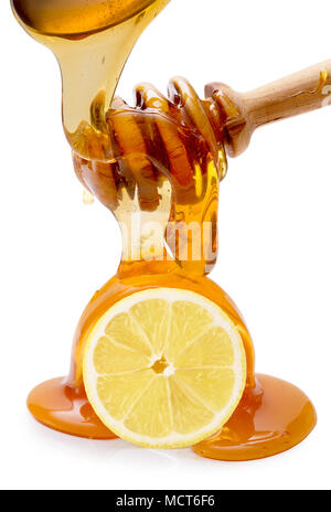 honey with lemon isolated on a white background. Stock Photo