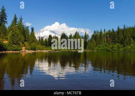 Mount Hood reflection on Mirror Lake on a blue sky day in Oregon Stock Photo